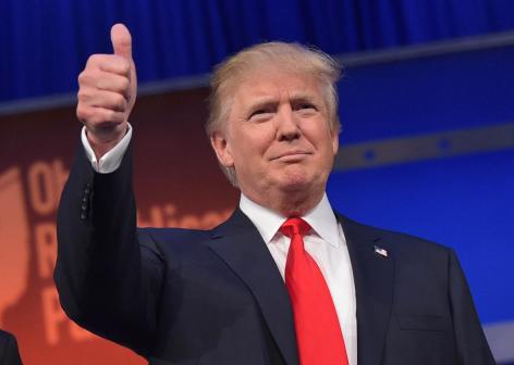 483208412-real-estate-tycoon-donald-trump-flashes-the-thumbs-up-crop-promo-xlarge2